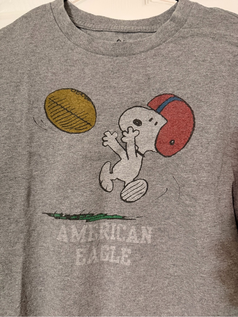 American Eagle Gray Long Sleeve Tee with Snoopy Football Graphic